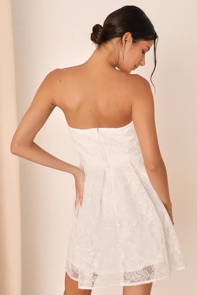 Score a Women's White Embroidered Strapless Mini Dress