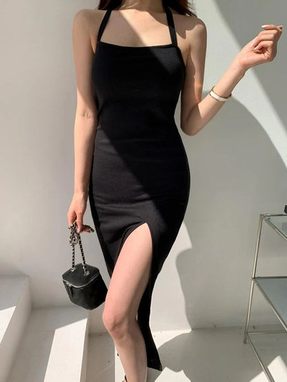 Sultry Silhouette: The Black Halter Neck Bodycon Midi Dress
